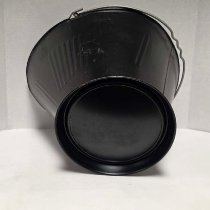 Vintage metal coal scuttle with bail handle for fireplace and wood stove use.

