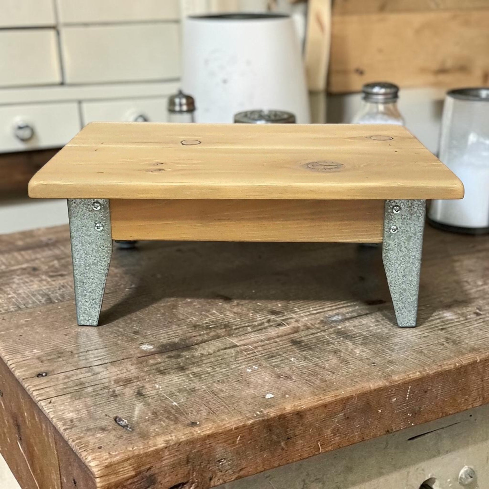 Handmade reclaimed cedar and barn metal serving riser with rustic charm.
