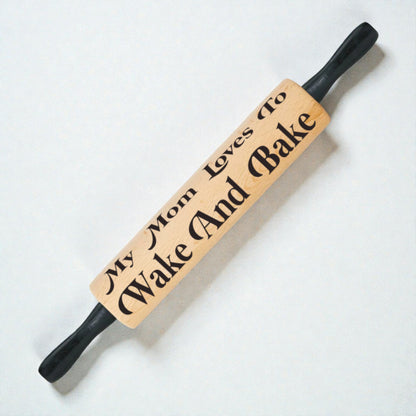 Wooden rolling pin with text on a white background