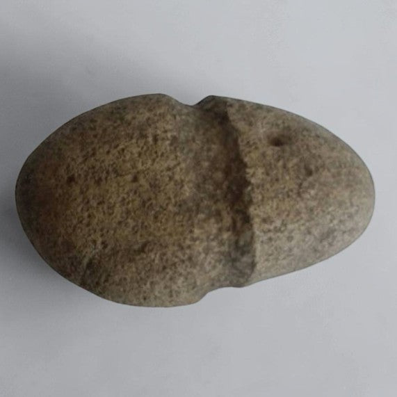 Native American stone axe hammerhead artifact with primitive craftsmanship and historical collectible appeal.