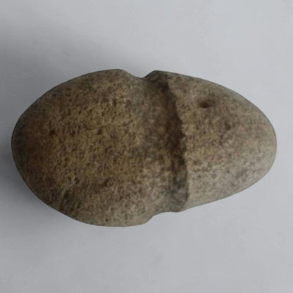 Native American stone axe hammerhead artifact with primitive craftsmanship and historical collectible appeal.