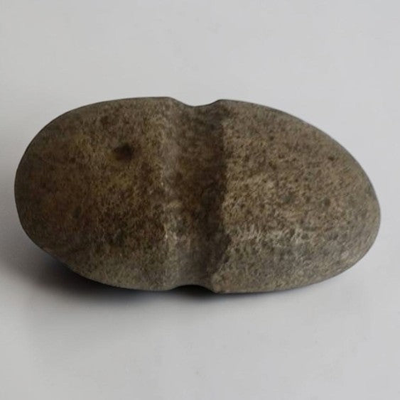 Native American stone axe hammerhead artifact with primitive craftsmanship and historical collectible appeal.