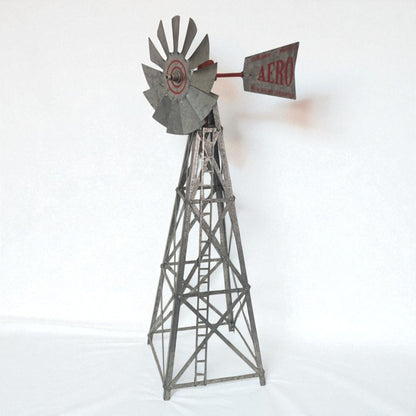 Metal windmill model on a white background