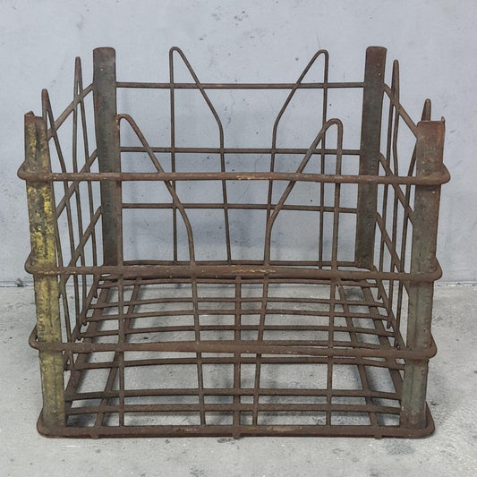 antique wire milk crate with beautiful primitive industrial character and aged patina.