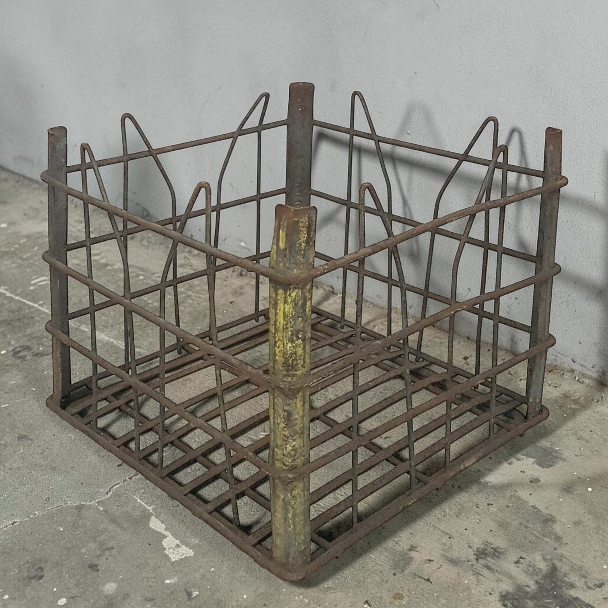 antique wire milk crate with beautiful primitive industrial character and aged patina.