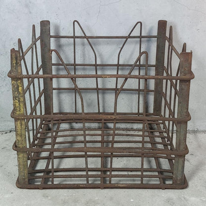 antique wire milk crate with beautiful primitive industrial character and aged patina.