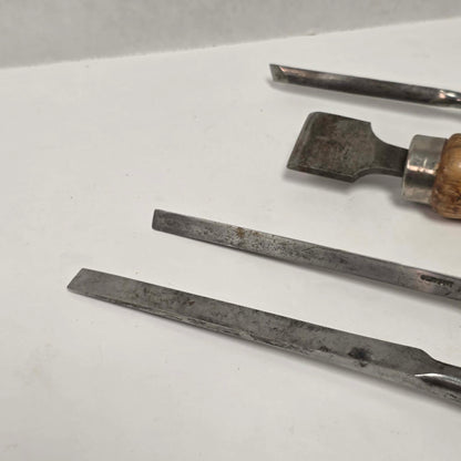 A beautiful four-piece set of antique woodworking chisels from the era when quality craftsmanship came first.