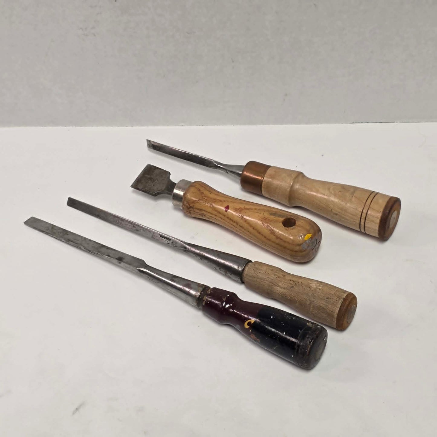 A beautiful four-piece set of antique woodworking chisels from the era when quality craftsmanship came first.