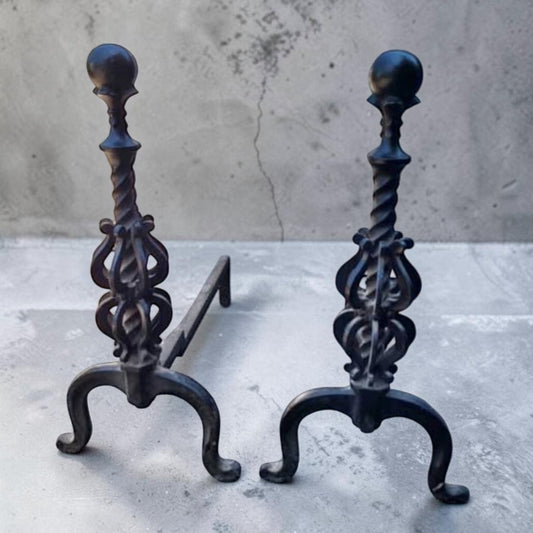 Pair of exquisitely ornate vintage wrought iron fireplace andirons.
