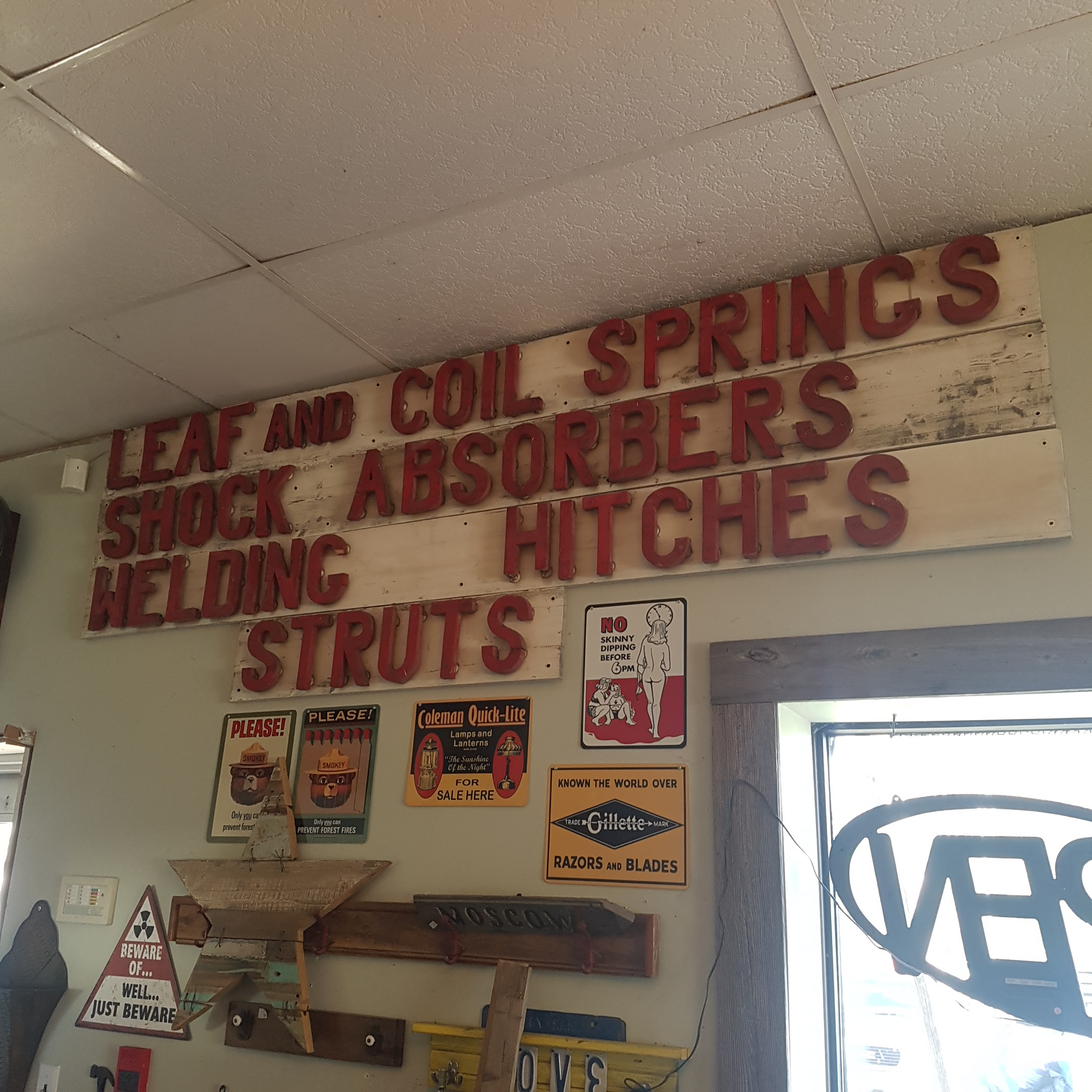 antique wooden automotive service station sign