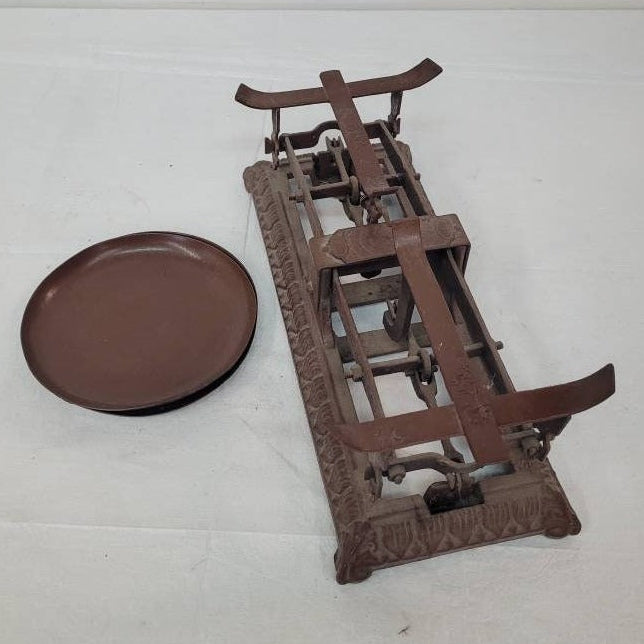 antique balance scale cast iron with two dishes