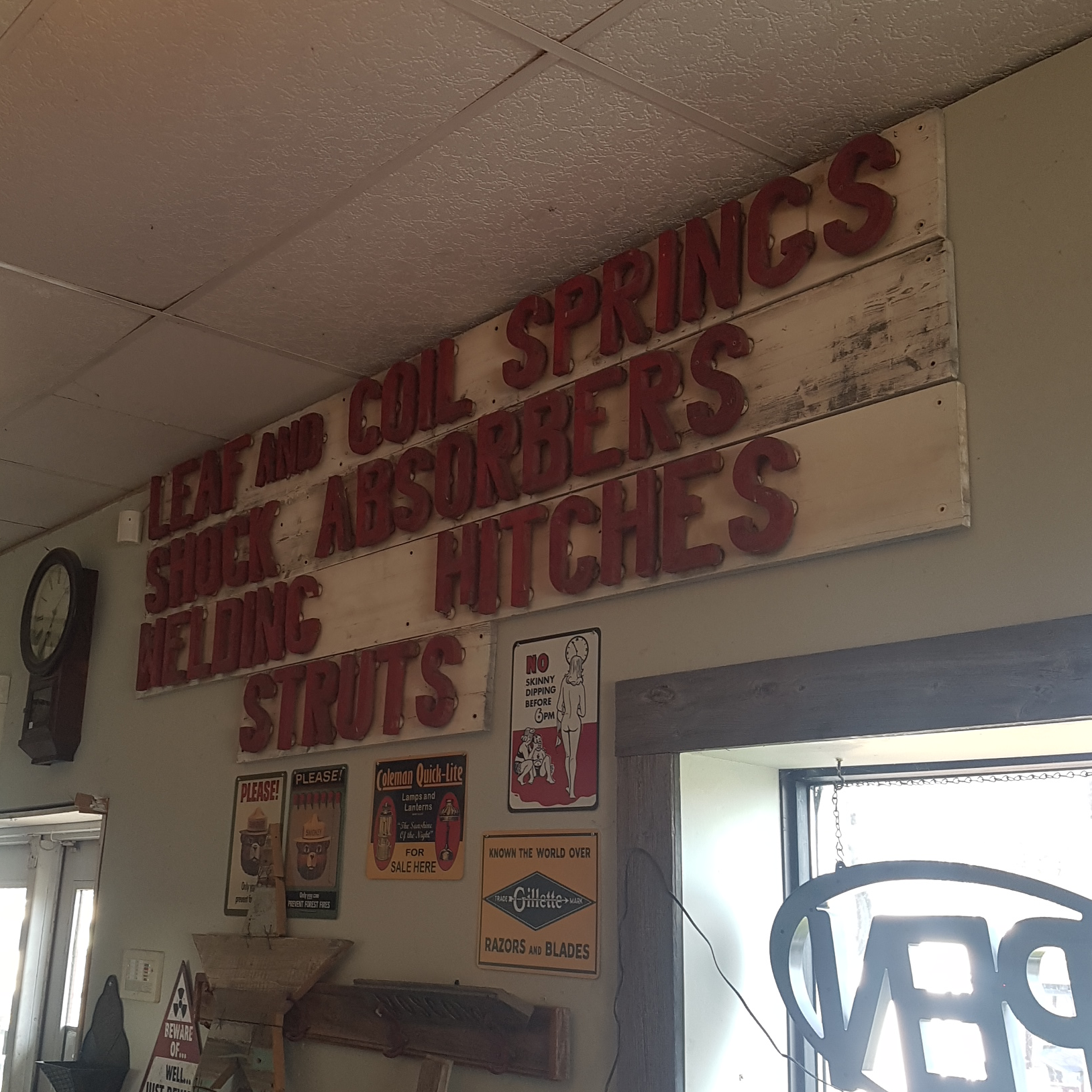 antique wooden automotive service station sign