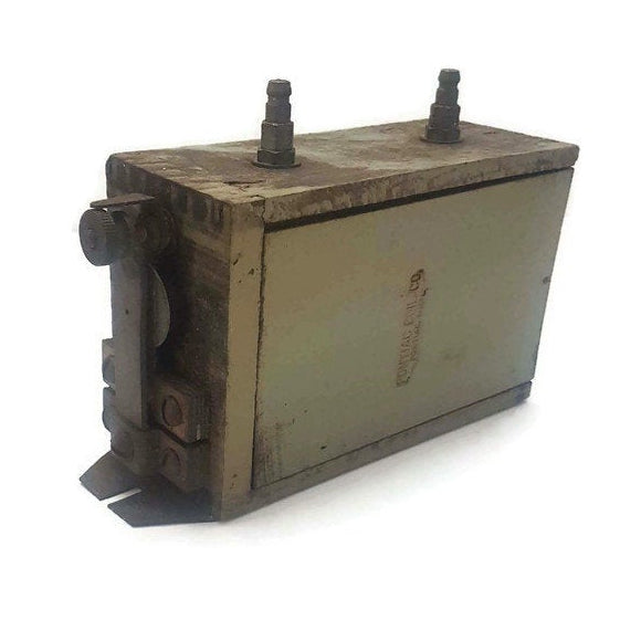 Antique Pontiac wooden T coil with embossed Pontiac Coil Co., Michigan.