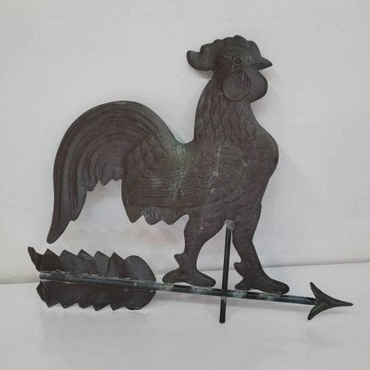 Antique hollow-bodied copper rooster weathervane with directional base, architectural salvage for farmhouse or barn decor.