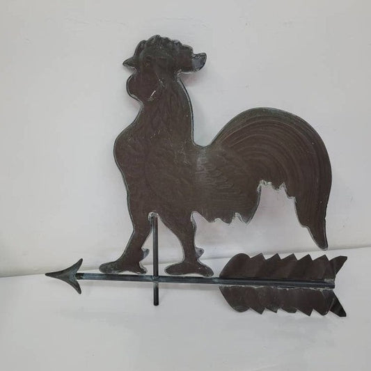 Antique hollow-bodied copper rooster weathervane with directional base, architectural salvage for farmhouse or barn decor.