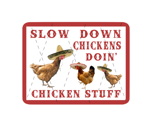 slow down sign chickens doing chicken stuff