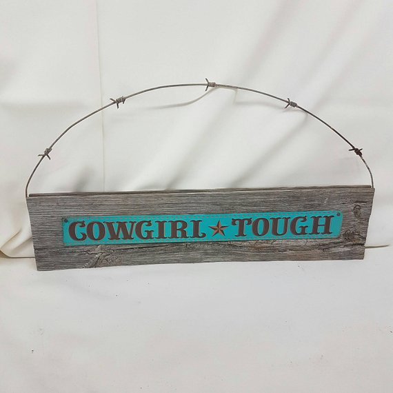 rustic cowgirl tough sign barn board and barbed wire