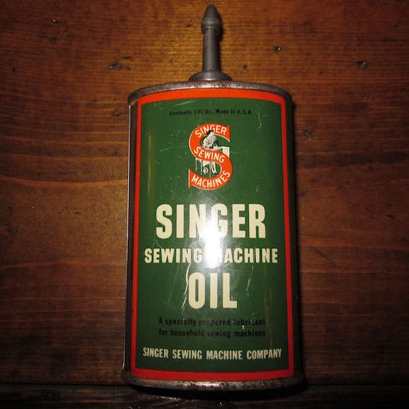 vintage singer sewing machine oil tin with lead top 3 oz.
