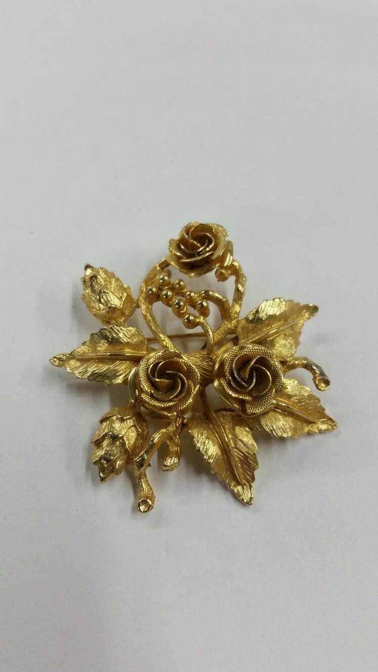 gold rose brooch