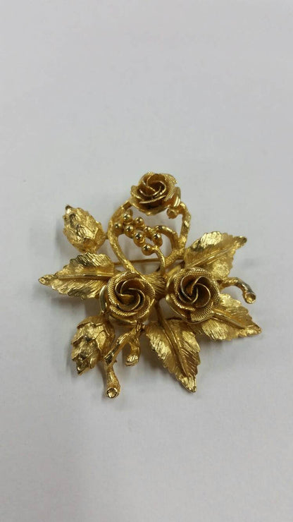gold rose brooch