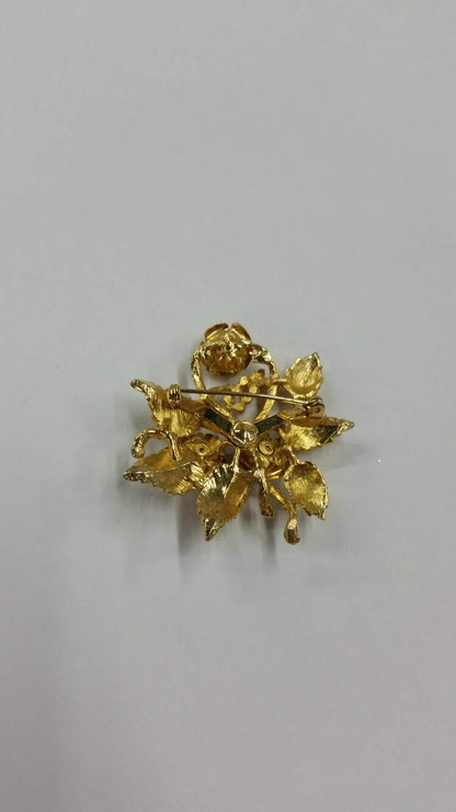 gold rose brooch