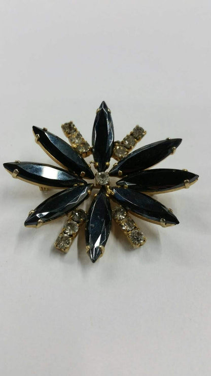 black stone and rhinestone flower brooch
