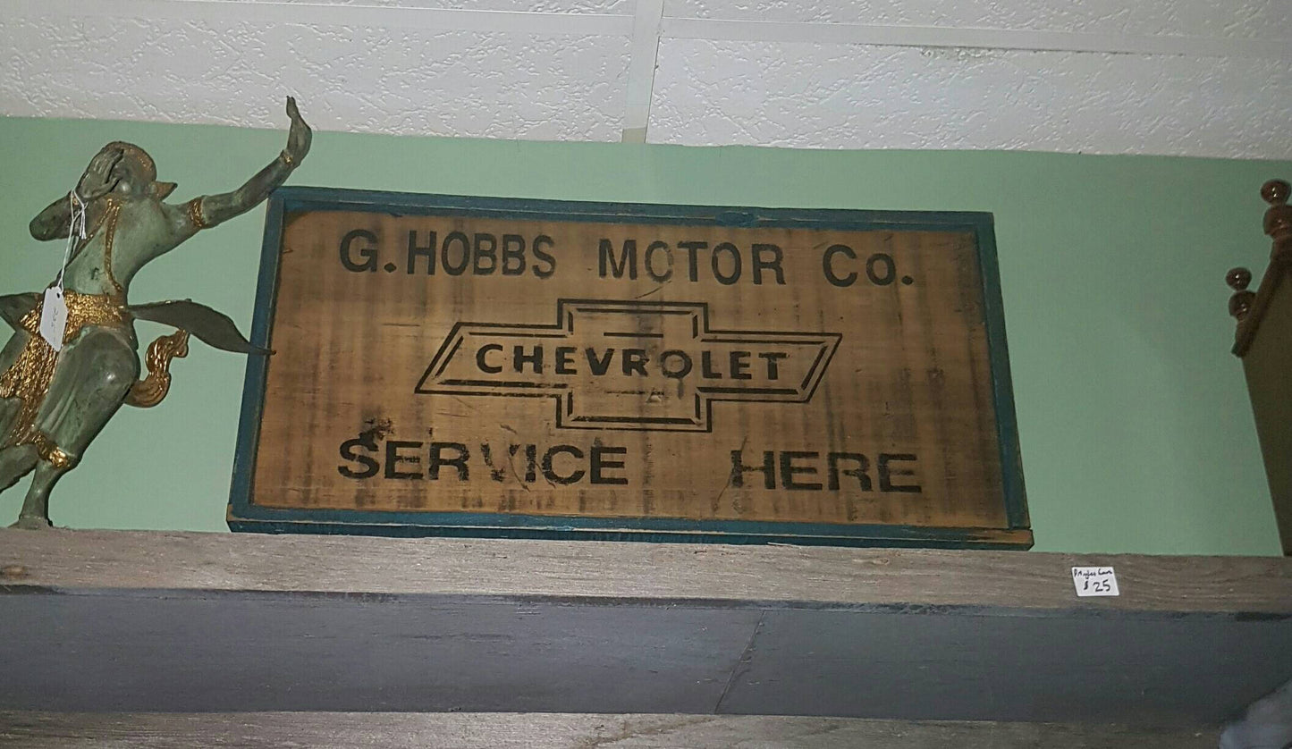 vintage style wooden chevrolet sign