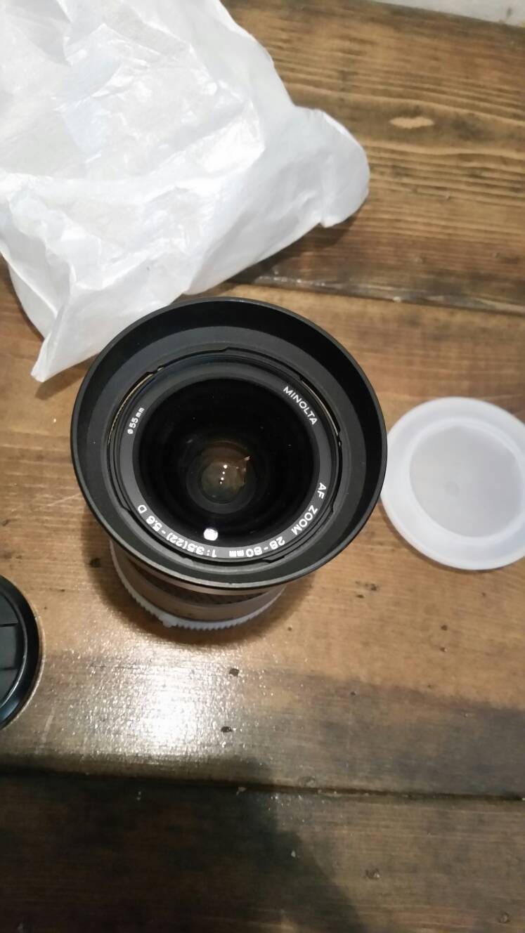minolta maxxum camera lens still in original packaging