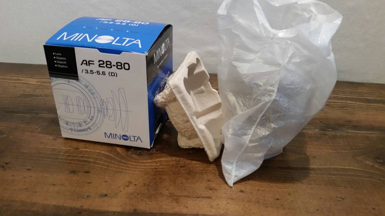 minolta maxxum camera lens still in original packaging