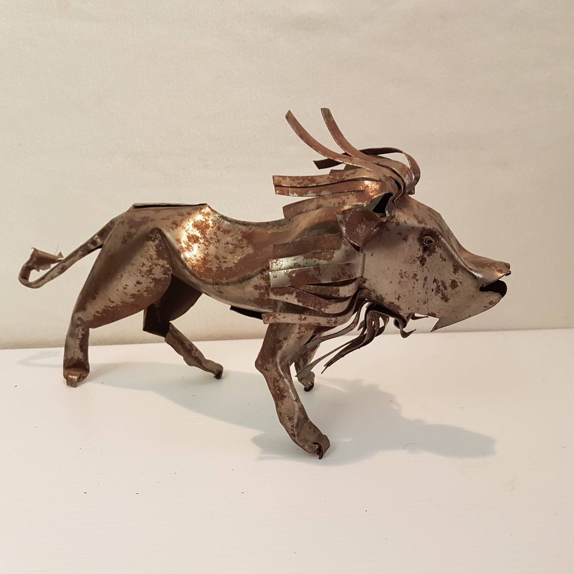 tin lion folk art