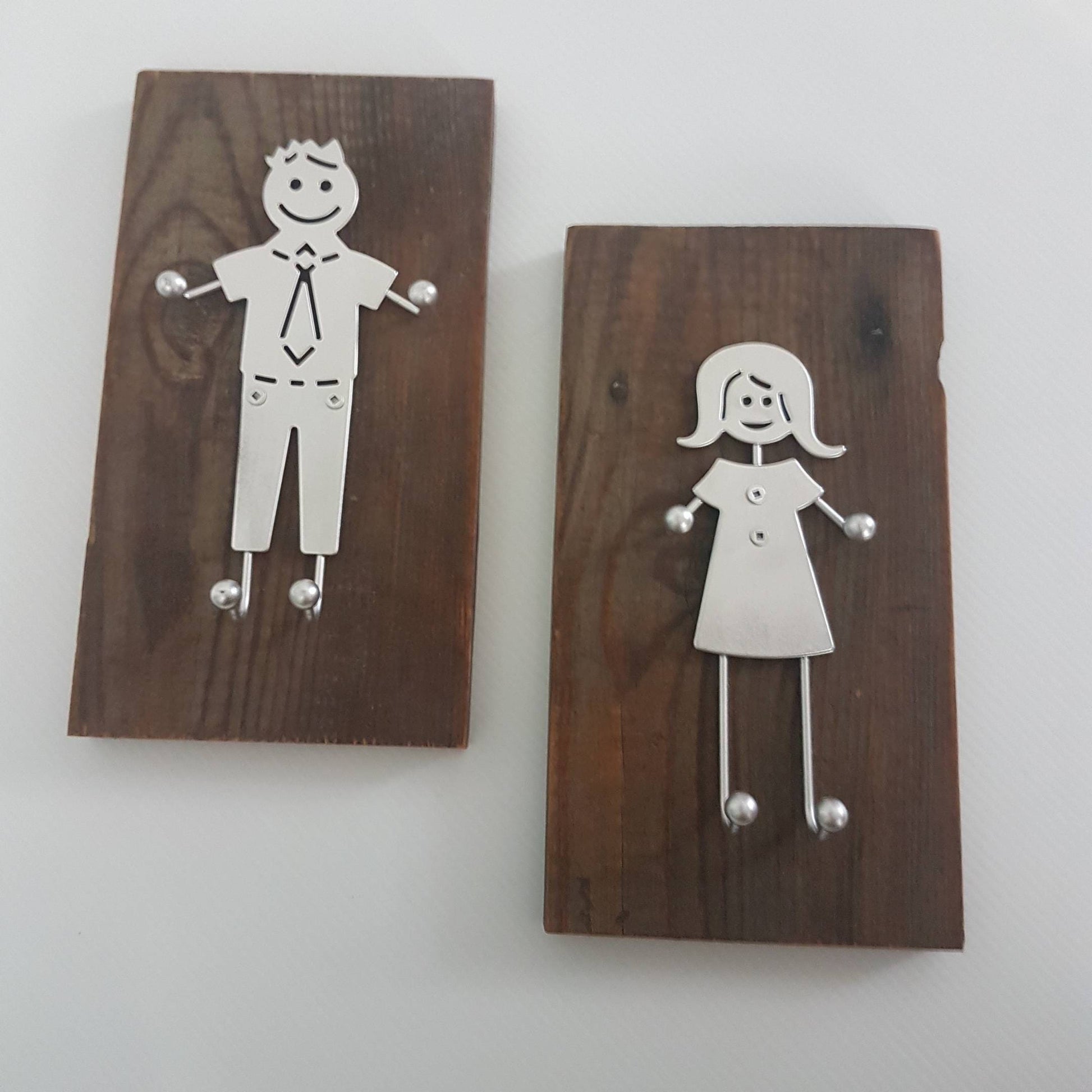 mens and womans bathroom restroom sign