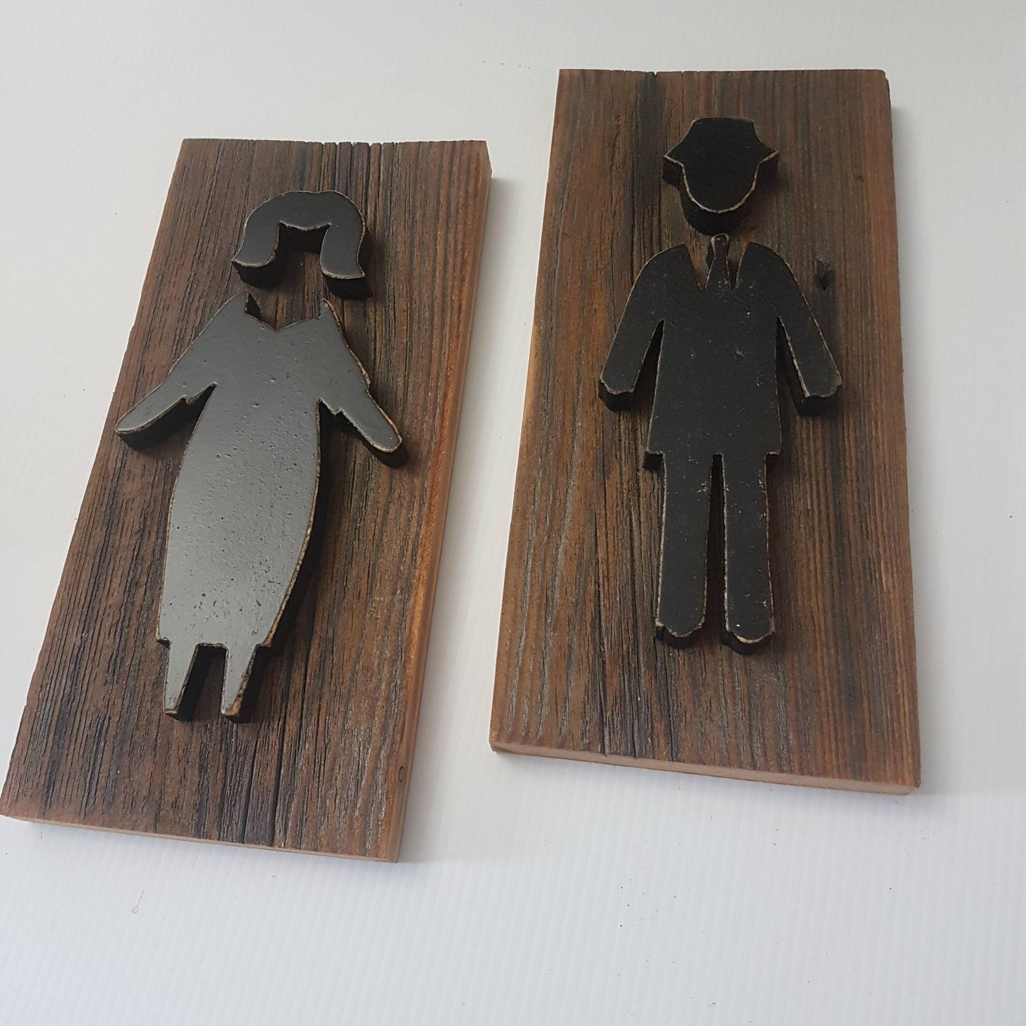 mens and womans bathroom restroom sign for