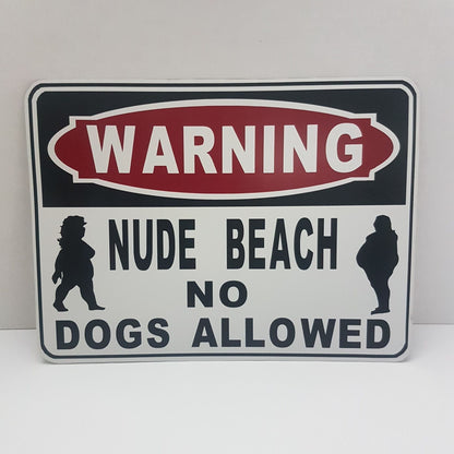 warning nude beach  funny sign