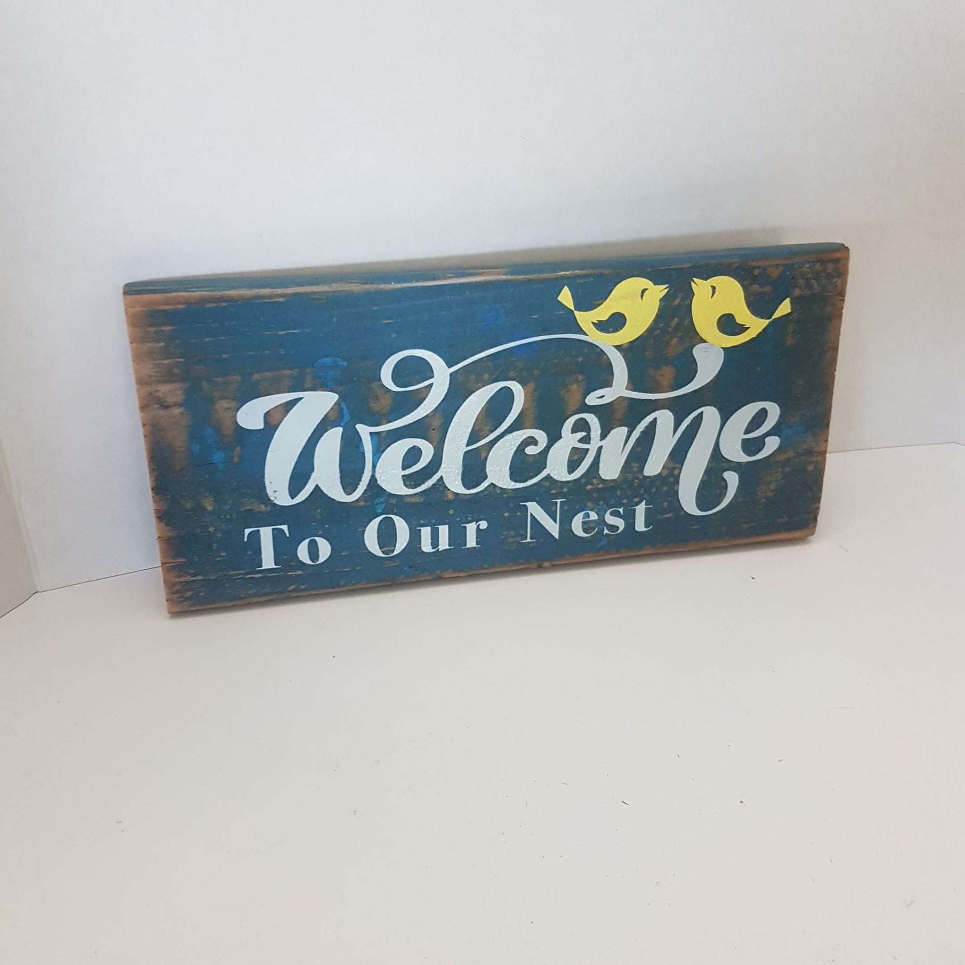 wooden handmade welcome to our nest