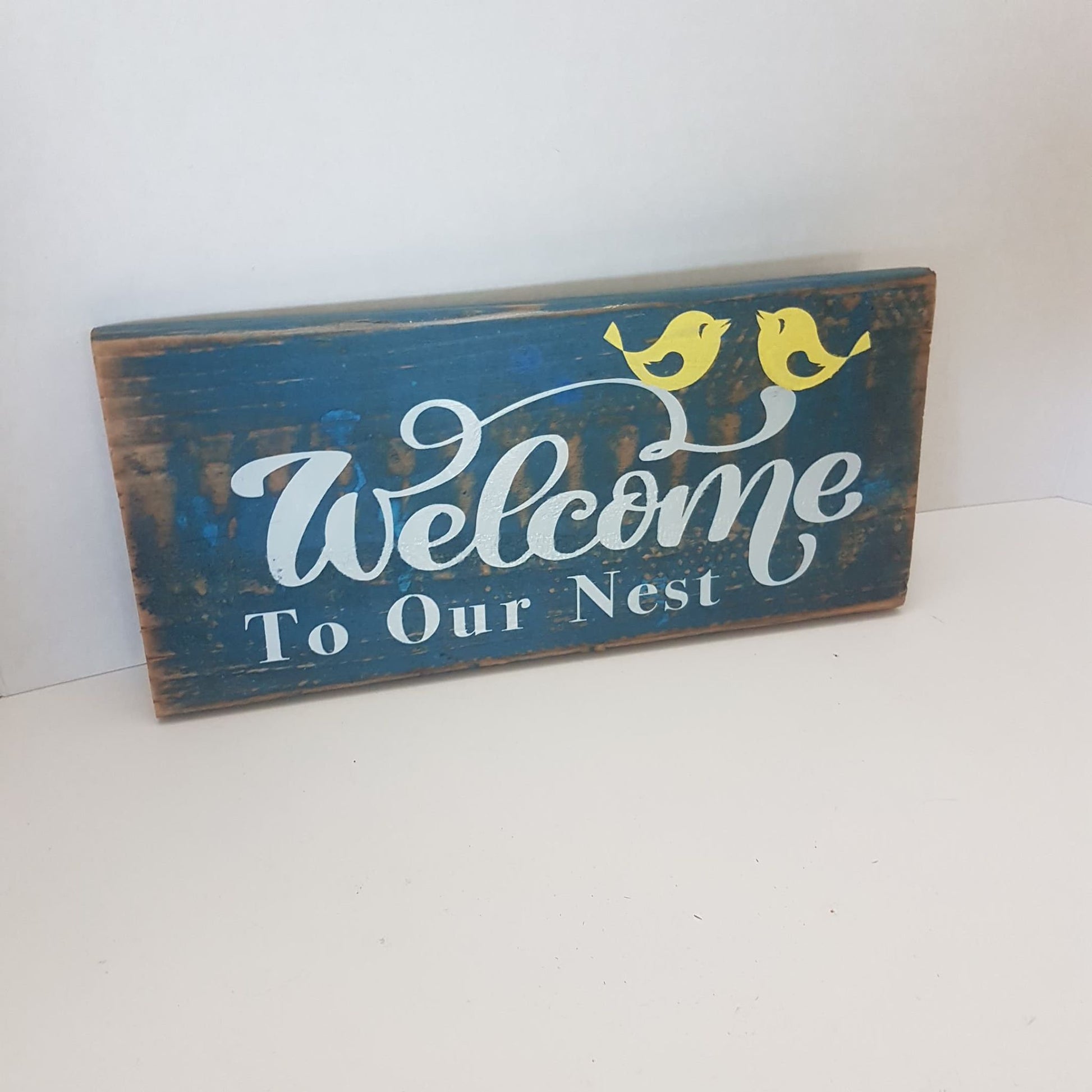 wooden handmade welcome to our nest