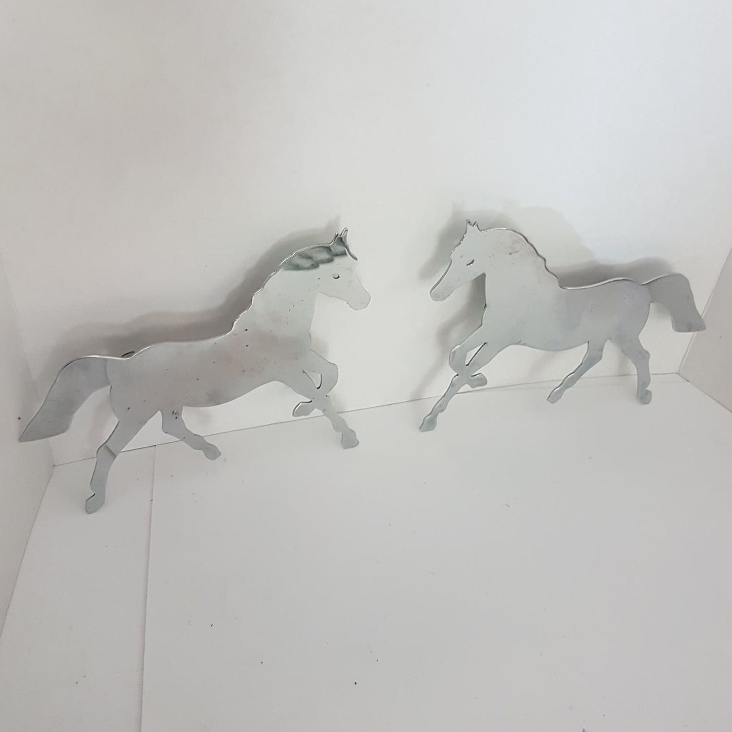 vintage chrome plated horses