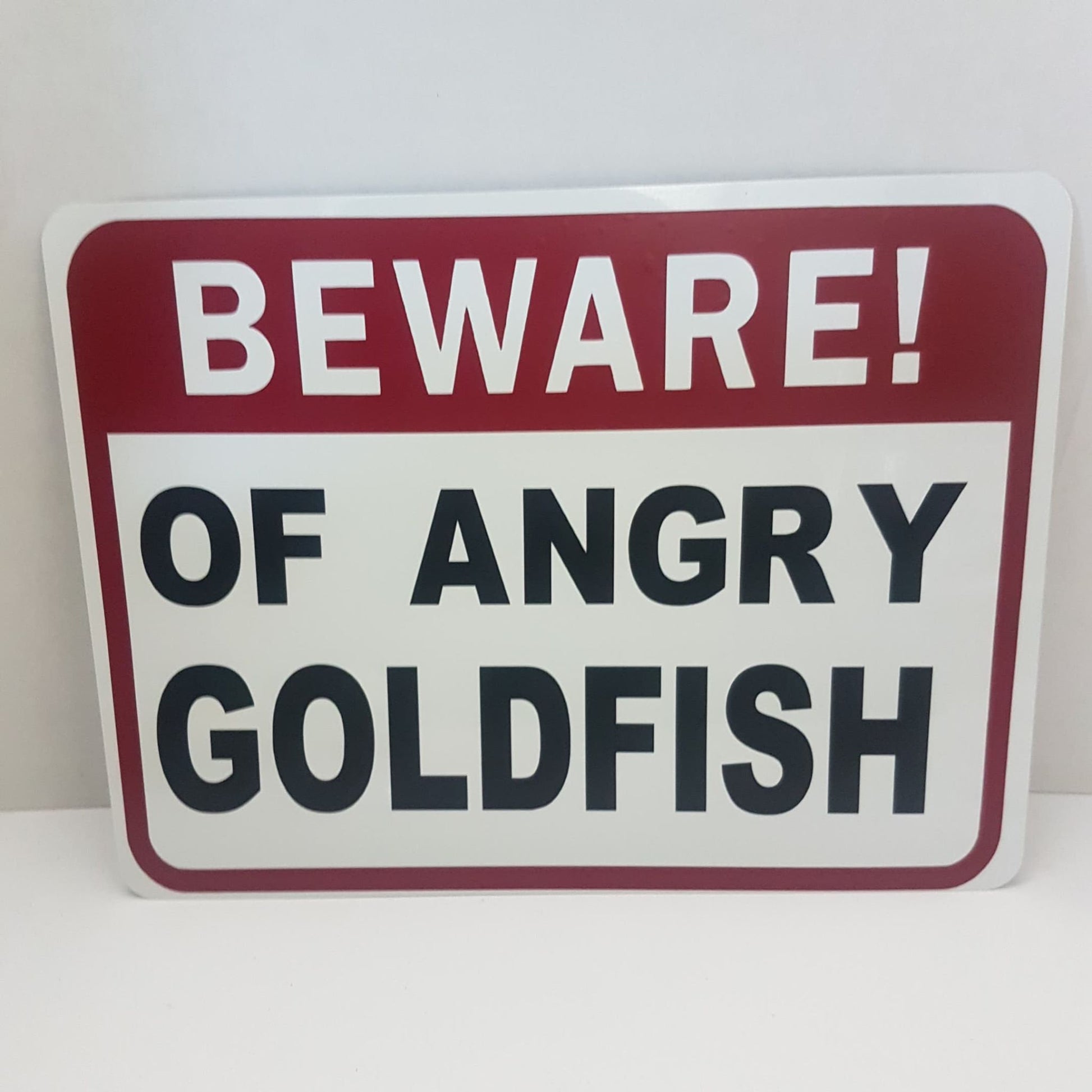 beware of angry goldfish sign
