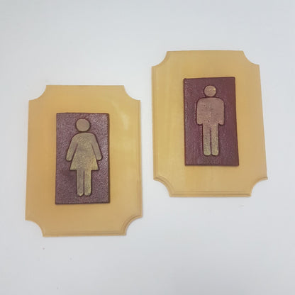 bathroom signs  cast iron and wood