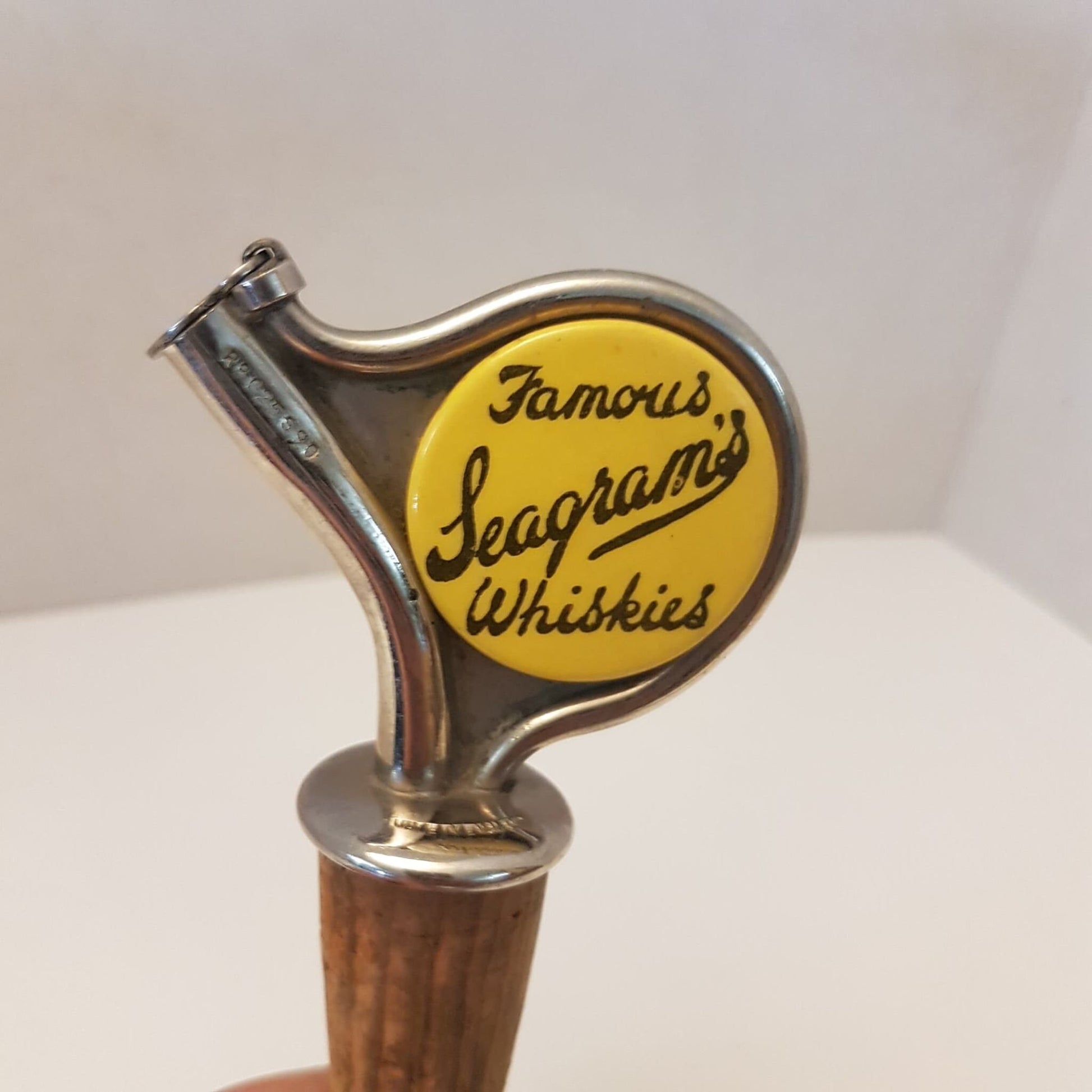 famous seagrams's whiskies bottle pourer antique
