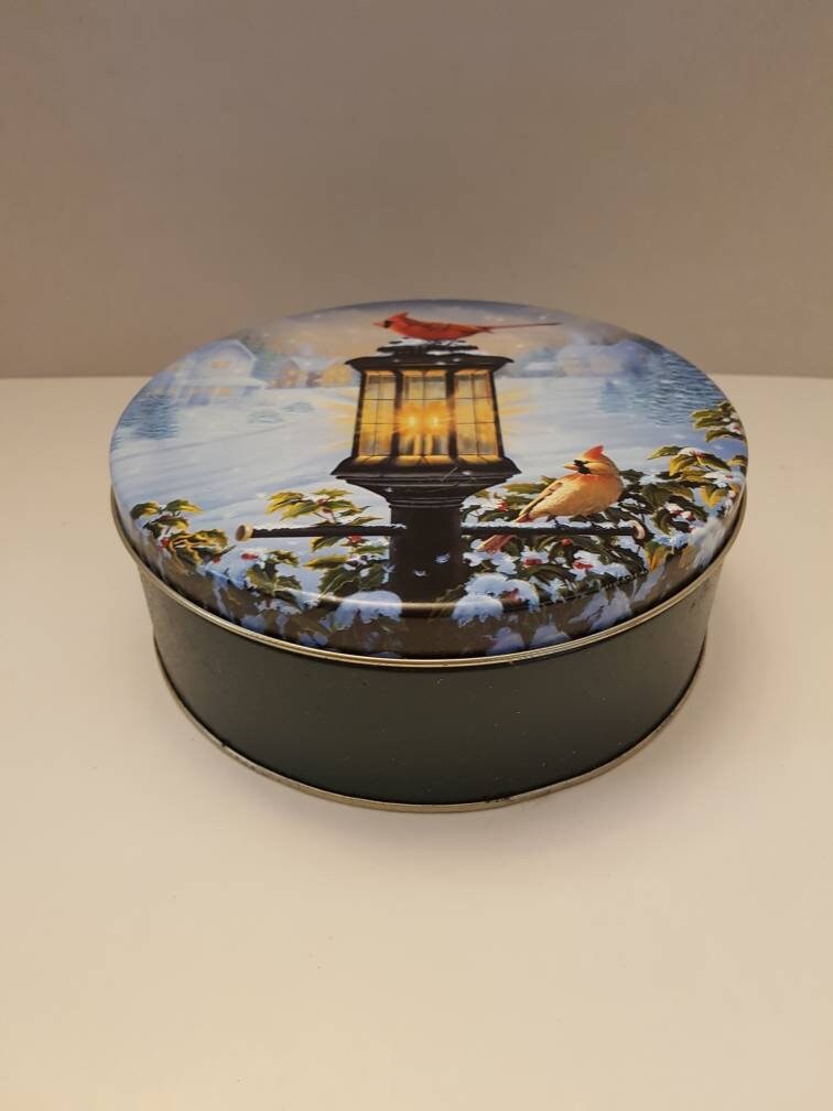vintage tin can with cardinal antique storage container / box