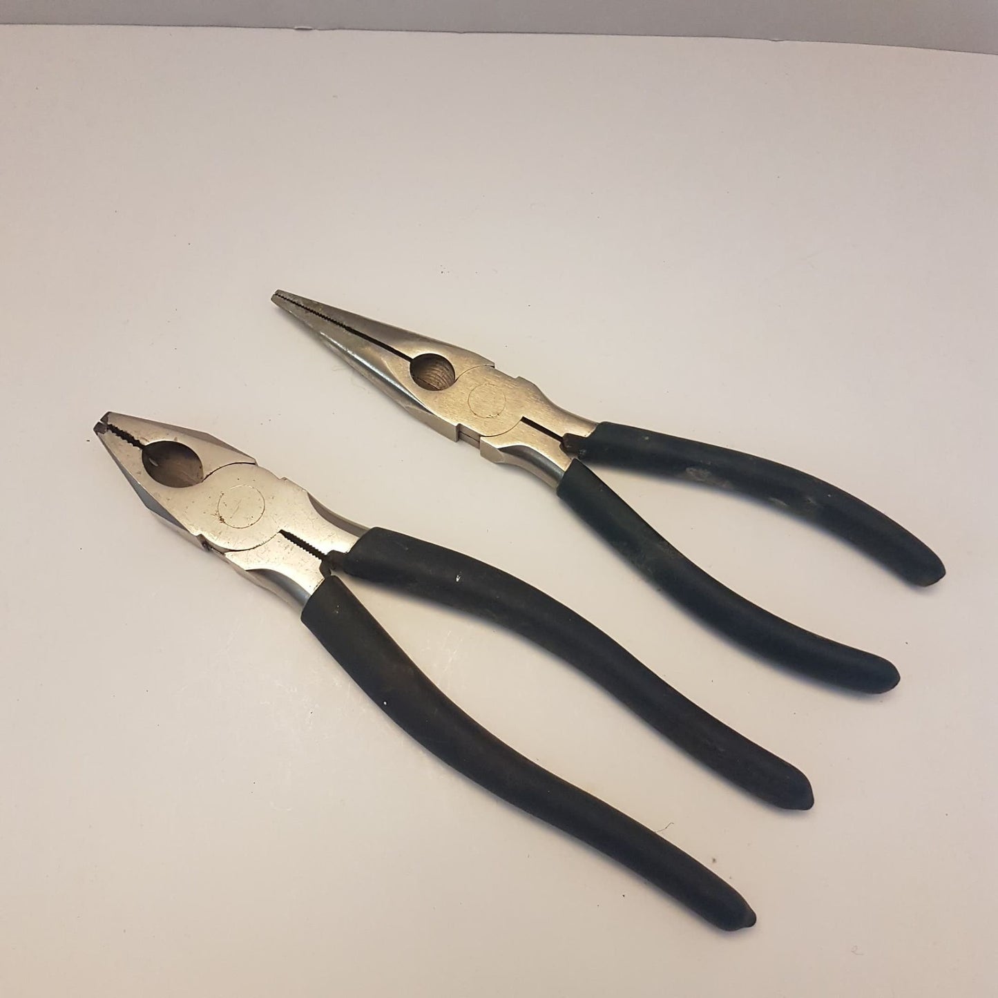 2 pairs of mastercraft pliers