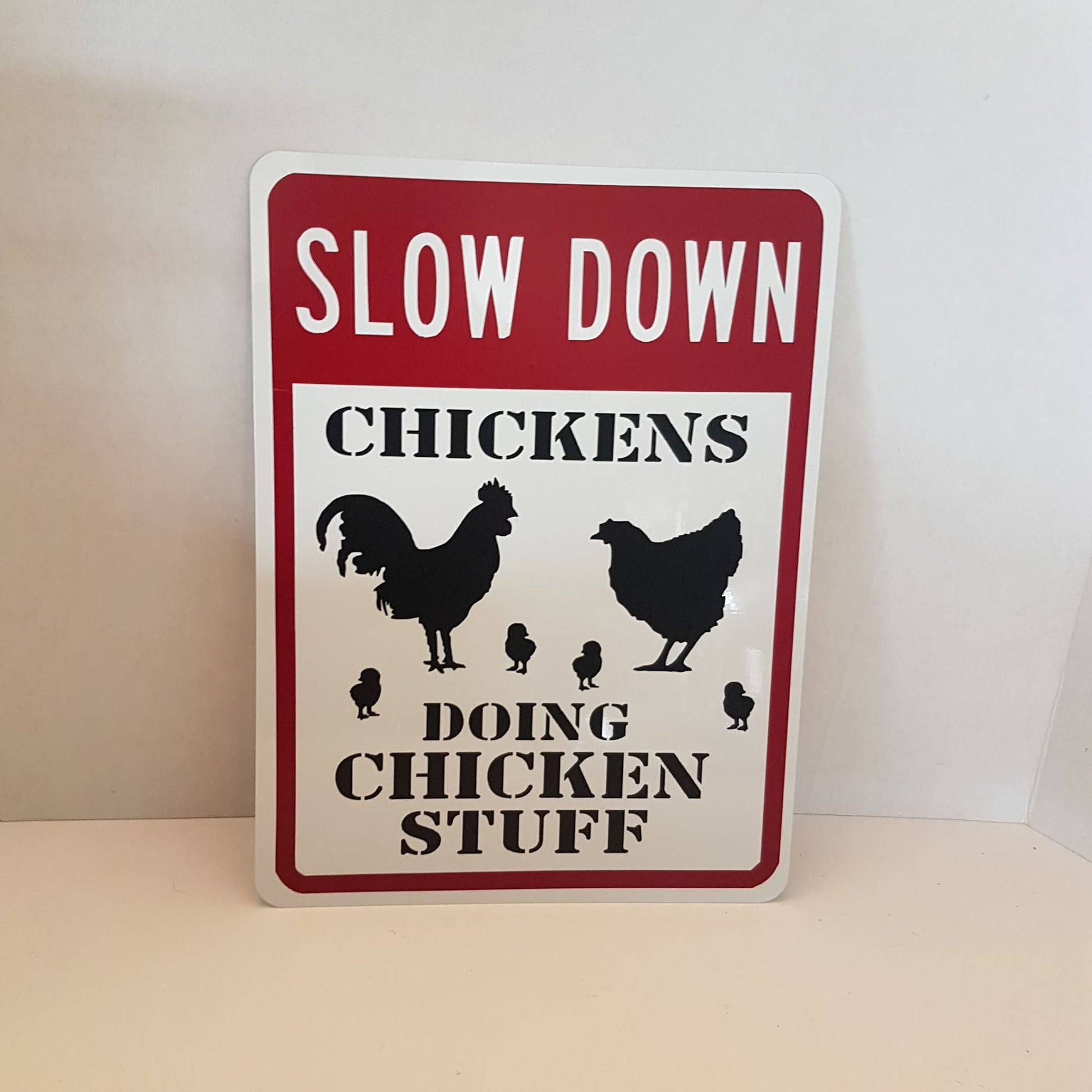 slow down children doing children stuff playground  / yard sign
