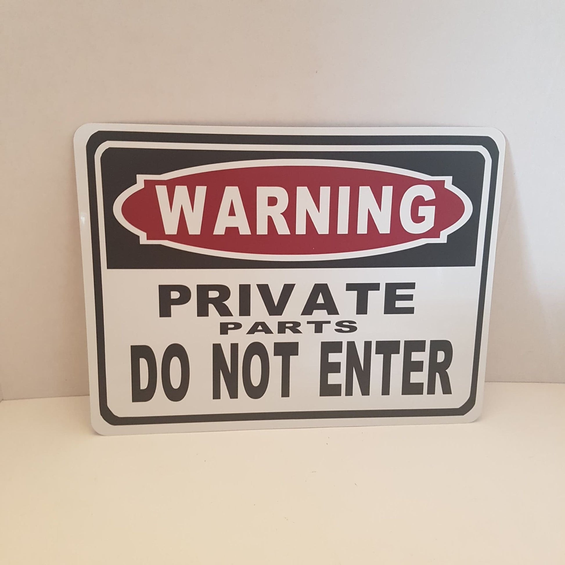 warning private parts do not enter funny sign
