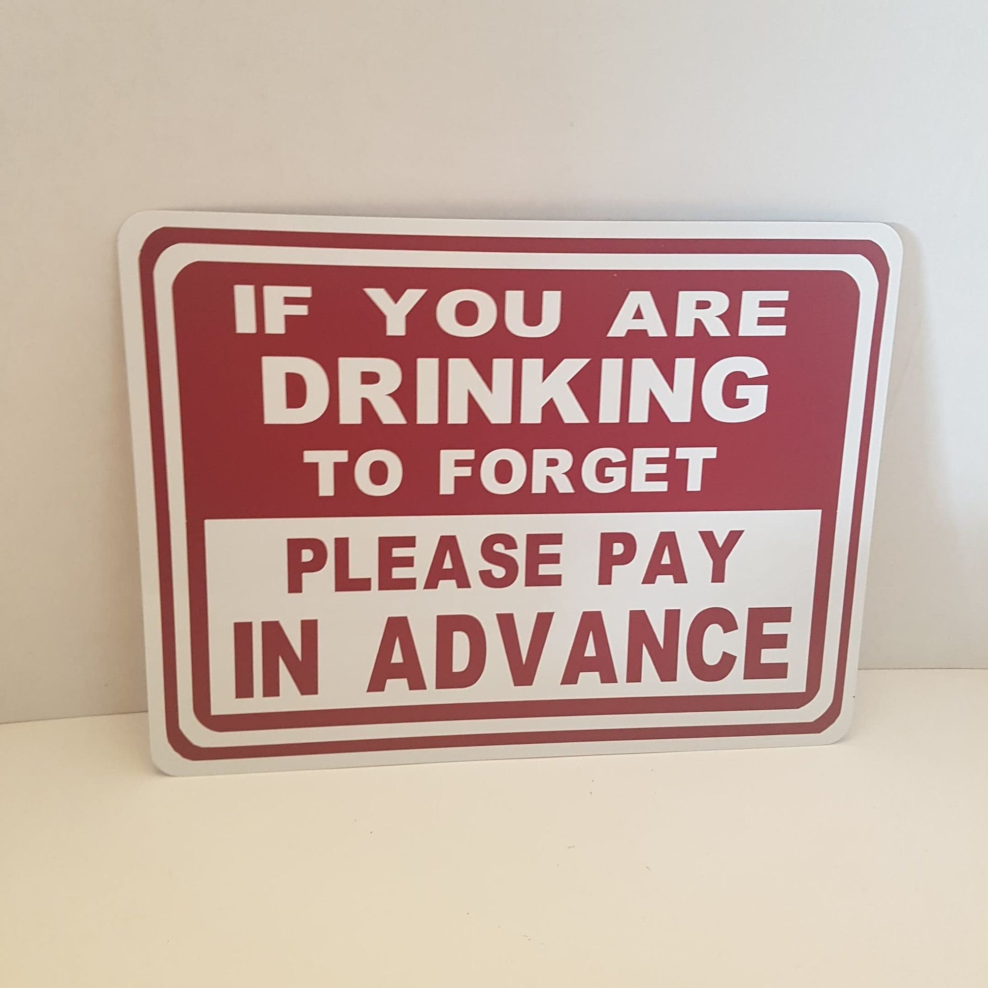 funny drinking sign if you are drinking to forget please pay in advance