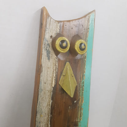 carved folk art wooden owl