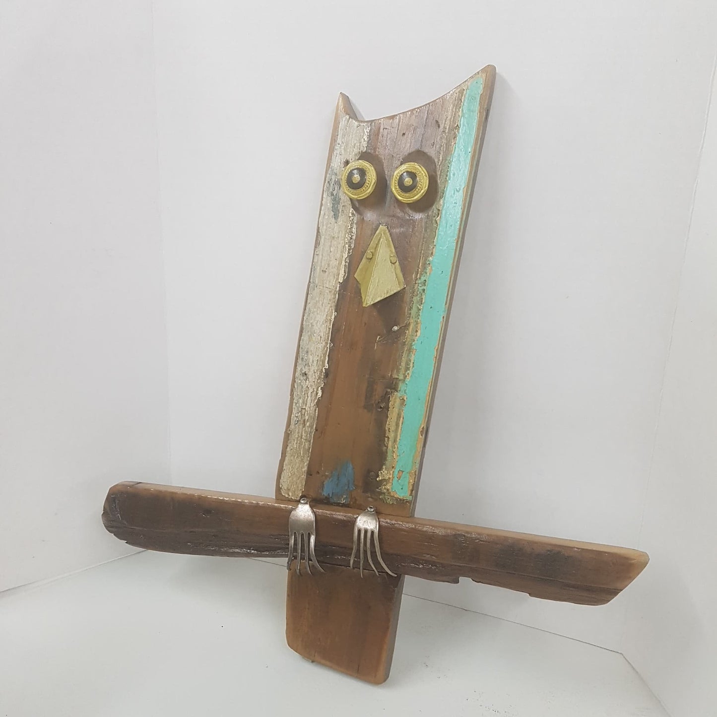 carved folk art wooden owl