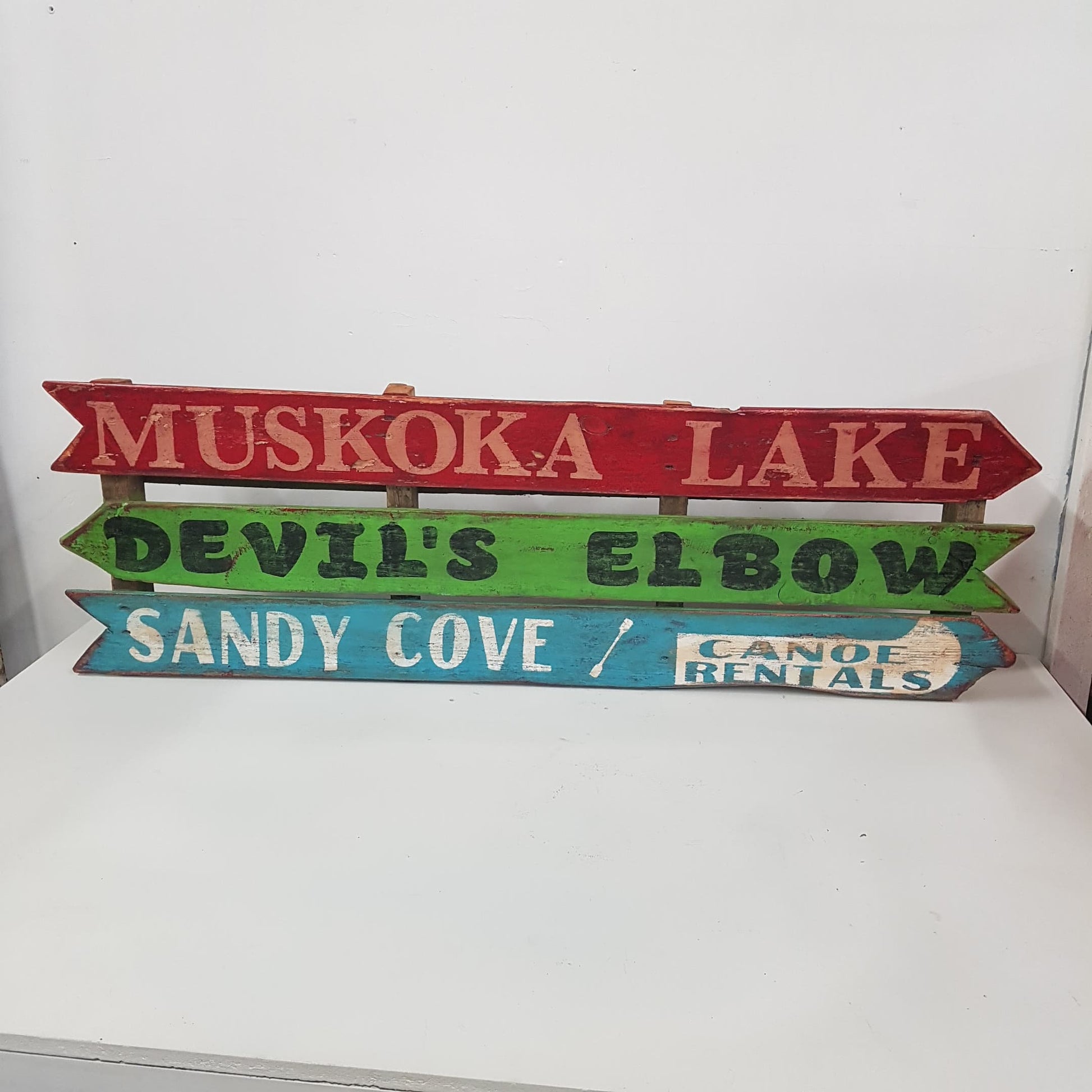 wooden muskoka lake cottage sign