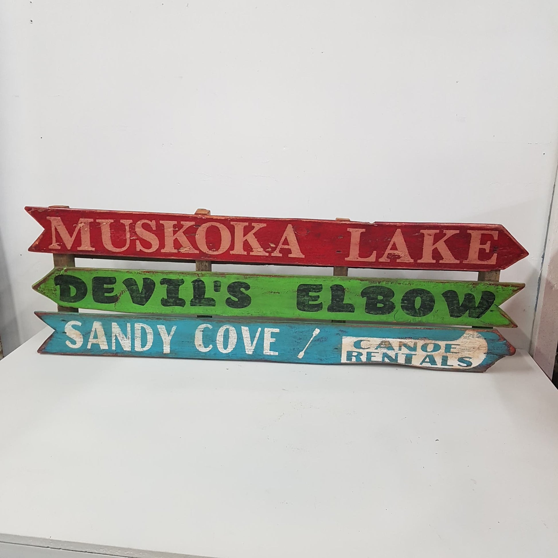 wooden muskoka lake cottage sign