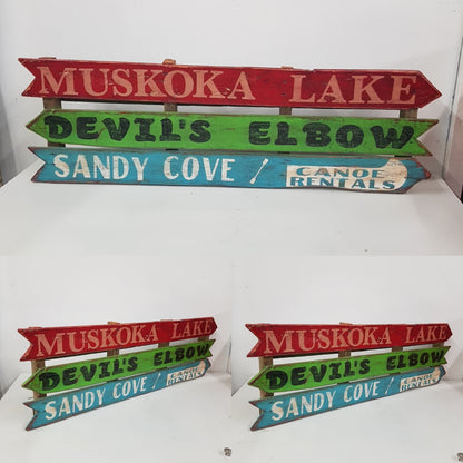 wooden muskoka lake cottage sign