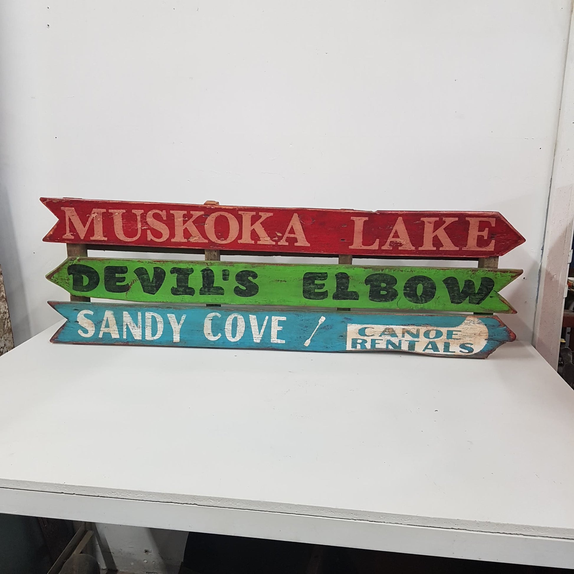 wooden muskoka lake cottage sign
